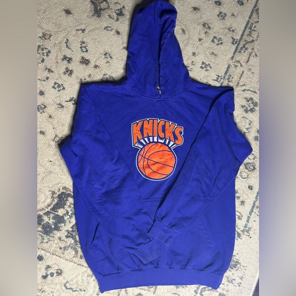NBA Other - New York Knicks blue and orange hoodie
Size: Medium Tall